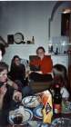 People eating cheese and drinking wine!