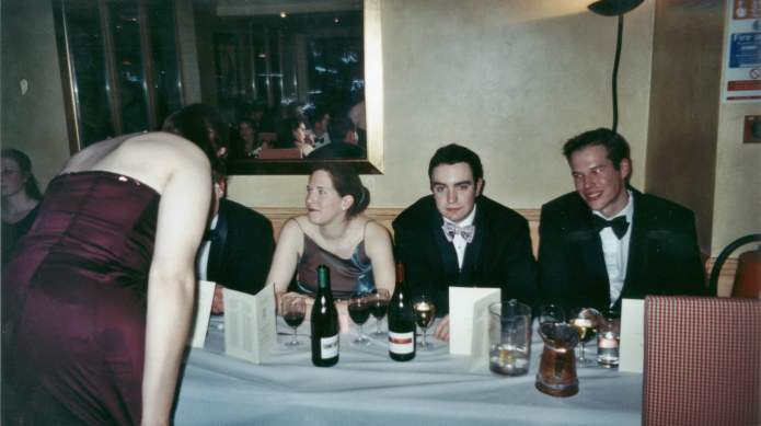 Martin looking pensive and wine at an angle